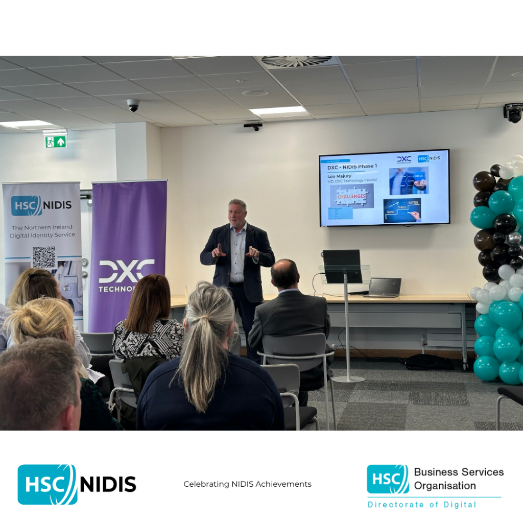 DXC addressing attendees of the NIDIS celebration event
