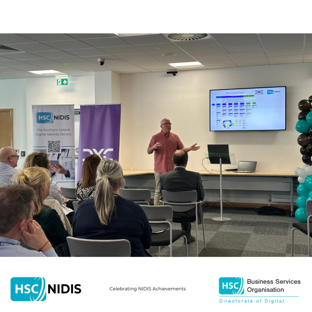 DXC addressing attendees of the NIDIS celebration event